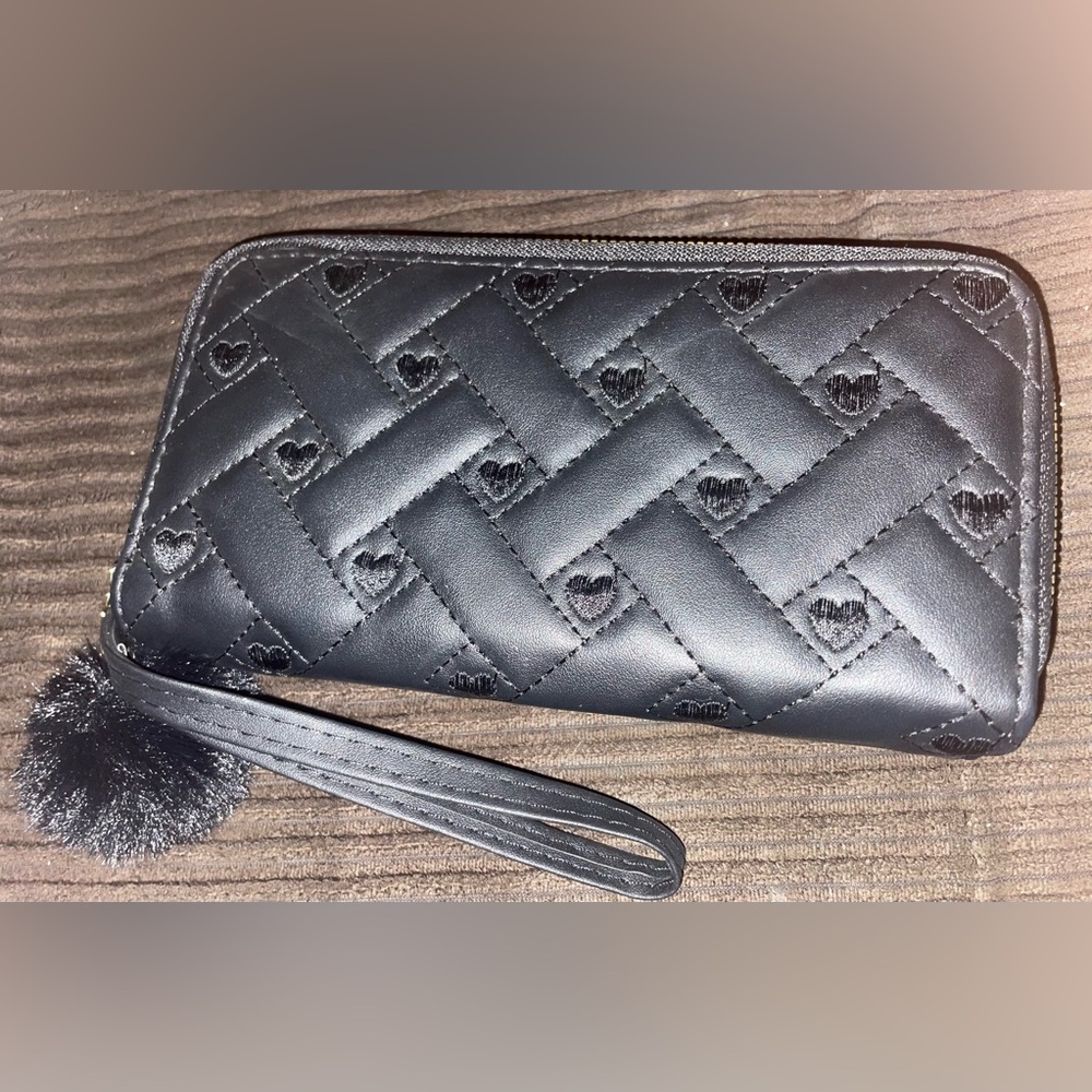 New black quilted clutch wallet.